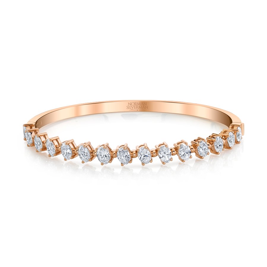 Oval - cut Diamonds set in 4 - prong pink gold bangle bracelet. - Chapel Hills Jewelry